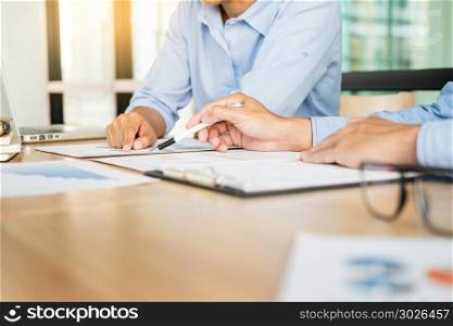 Business team hands at working with plan on office desk and modern digital computer laptop. Administrator financial inspector and secretary making report, calculating balance. . Business team hands at working with plan on office desk and mode