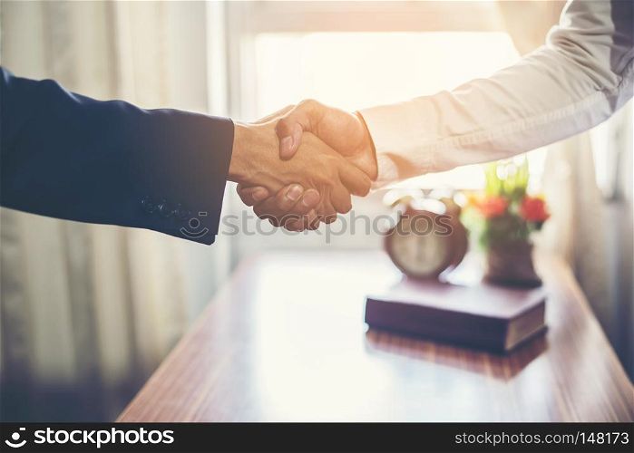 Business team handshake success.