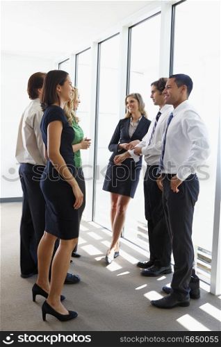 Business Team Having Informal Meeting In Office