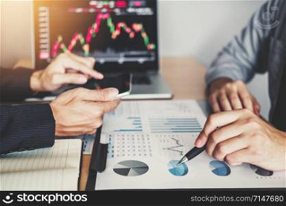 Business Team Investment Entrepreneur Trading discussing and analysis graph stock market trading,stock chart concept