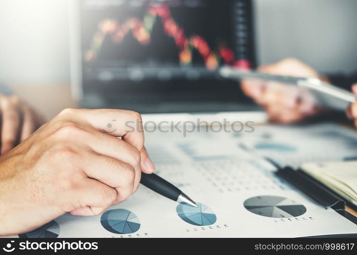 Business Team Investment Entrepreneur Trading discussing and analysis graph stock market trading,stock chart concept