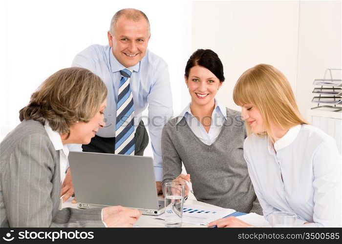 Business team meeting executive businessman with happy colleagues in office
