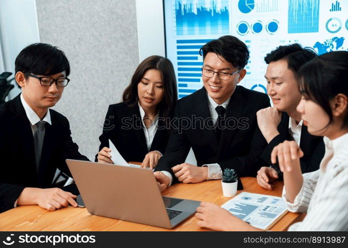 Business team of financial data analysis meeting with business intelligence, report paper and dashboard on laptop for marketing strategy. Business people working together to promote harmony in office.. Business team of financial data analysis meeting report paper in harmony office.