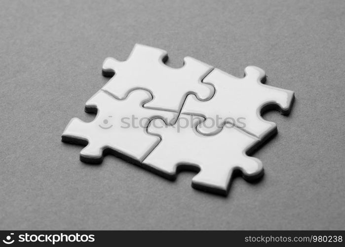 Business team, teamwork by jigsaw