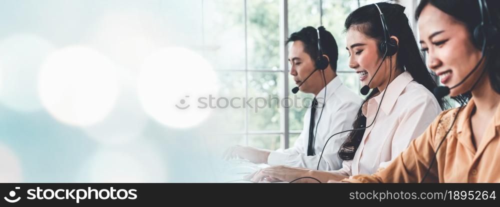 Business team wearing headset working actively in office . Call center, telemarketing, customer support agent provide service on telephone video conference call.. C1-C2-C3