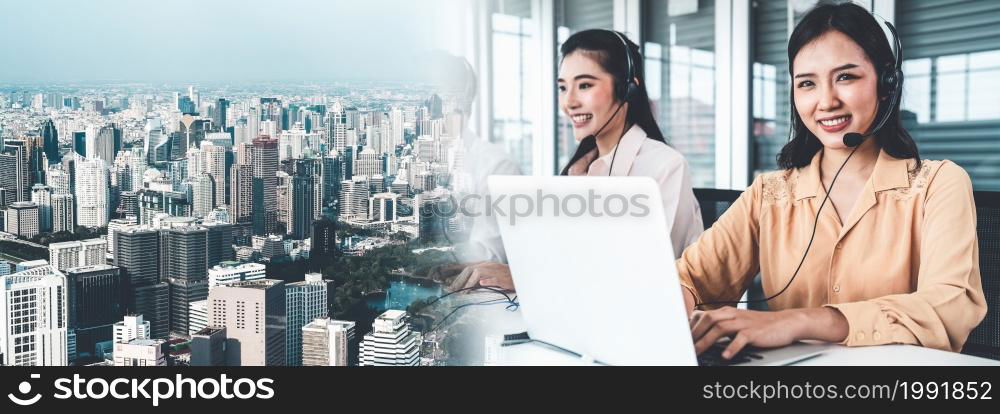 Business team wearing headset working actively in office . Call center, telemarketing, customer support agent provide service on telephone video conference call.. Business team wearing headset working actively in office