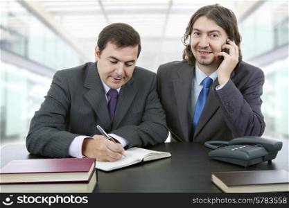 business team working at a desk, at the office