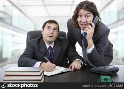 business team working at a desk, at the office