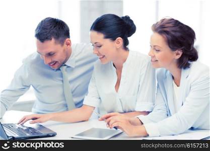 business team working with tablet pc and laptop in office. business team working in office