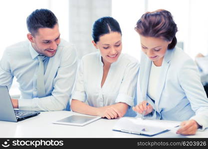 business team working with tablet pc and laptop in office. business team working in office