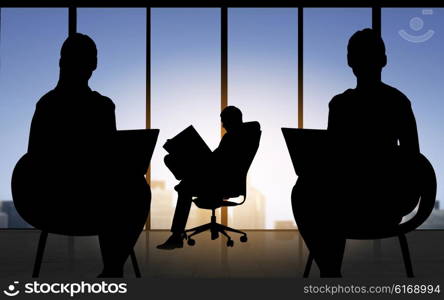 business, teamwork and people concept - silhouette of people with laptops and documents working over office window background