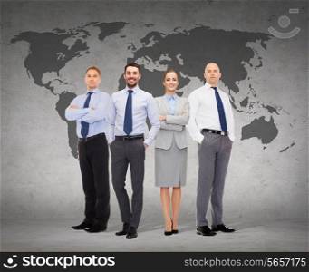 business, teamwork, global connection and people concept - group of smiling businessmen over gray concrete wall with world map background