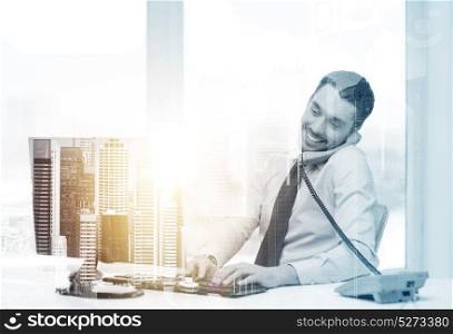 business, technology and communication concept - smiling businessman with computer calling on phone at office over city background and double exposure effect. businessman with computer calling phone at office