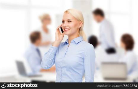 business, technology and education concept - friendly young smiling businesswoman with smartphone