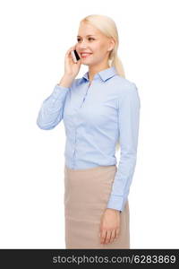 business, technology and education concept - friendly young smiling businesswoman with smartphone