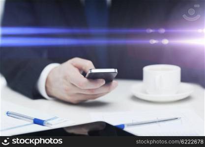 business, technology and interent concept - businessman with smartphone reading news
