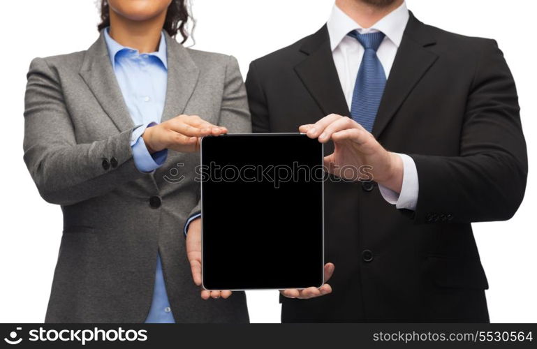 business, technology and internet concept - businessman and businesswoman with blank black tablet pc screen