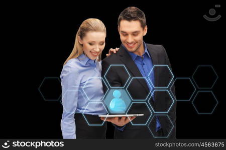 business, technology and network concept - businessman and businesswoman with tablet pc computer and hexagonal hologram over black background. businesspeople with tablet pc and network hologram. businesspeople with tablet pc and network hologram