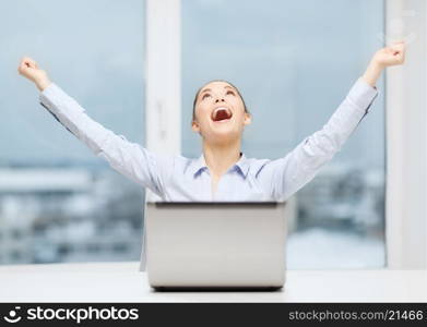 business, technology and office concept - screaming businesswoman with laptop in office