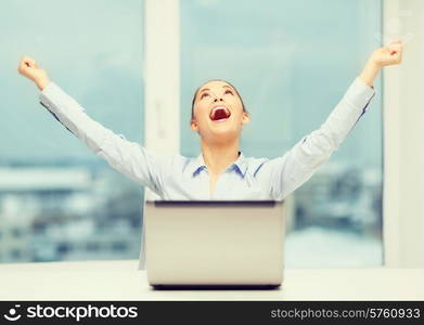 business, technology and office concept - screaming businesswoman with laptop in office