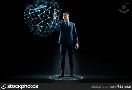 business, technology and people concept - businessman in suit touching virtual network hologram over black background. businessman in suit touching