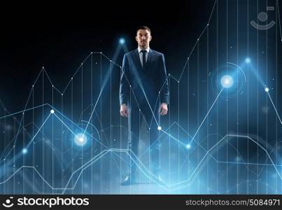 business, technology and people concept - businessman in suit with virtual chart over black background. businessman in suit over black with virtual graph. businessman in suit over black with virtual graph