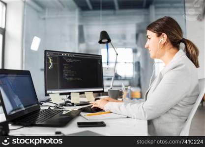 business, technology and people concept - businesswoman with computer working at office. businesswoman with computer working at office