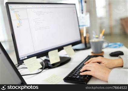 business, technology and people concept - businesswoman with computer working at office. businesswoman with computer working at office