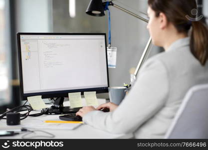 business, technology and people concept - businesswoman with computer working at office. businesswoman with computer working at office