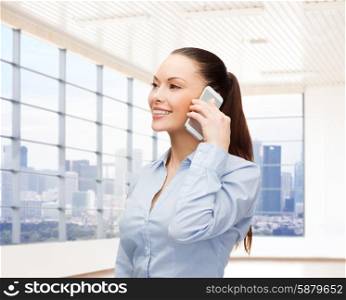 business, technology and people concept - smiling businesswoman calling on smartphone over office room or new apartment background
