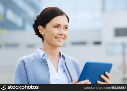 business, technology and people concept - young smiling woman with tablet pc computer over office building