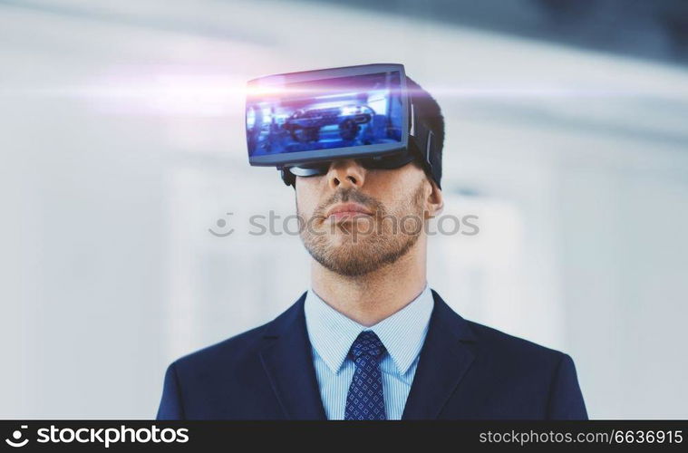 business, technology, augmented and virtual reality concept - businessman with some machine on display of vr headset at office. businessman with virtual reality headset at office