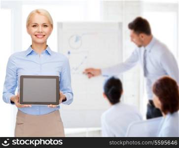 business, technology, internet and advertisement concept - smiling businesswoman with blank black tablet pc computer screen