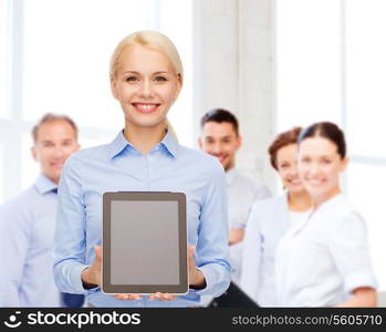 business, technology, internet and advertisement concept - smiling businesswoman with blank black tablet pc computer screen