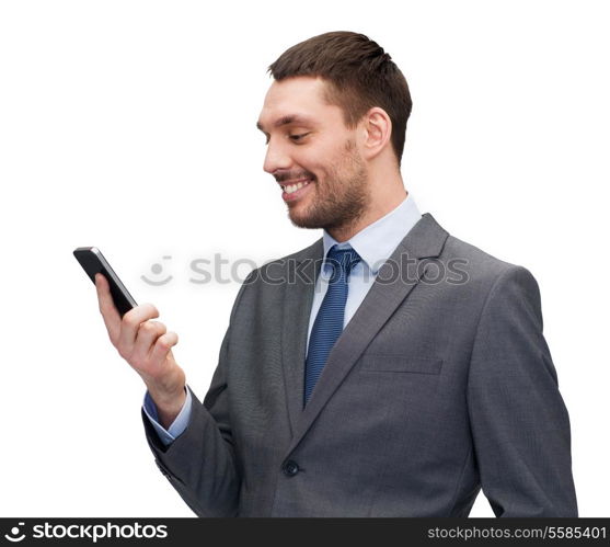 business, technology, internet and education concept - friendly young smiling businessman with smartphone