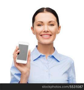 business, technology, internet and education concept - friendly young smiling businesswoman with smartphone blank screen