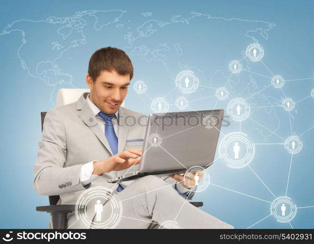 business, technology, internet and networking concept - businessman networking with laptop pc and virtual screens