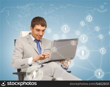 business, technology, internet and networking concept - businessman networking with laptop pc and virtual screens