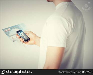 business, technology, internet and news concept - man with smartphone reading news