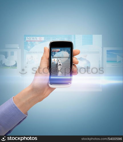 business, technology, internet and news concept - woman hand showing smartphone with news app