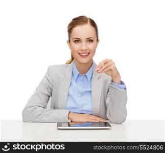 business, technology, internet and office concept - smiling businesswoman with tablet pc computer holding something imaginary