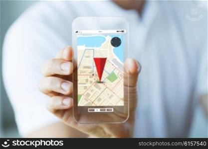 business, technology, navigation, location and people concept - close up of male hand holding and showing transparent smartphone with gps navigator map