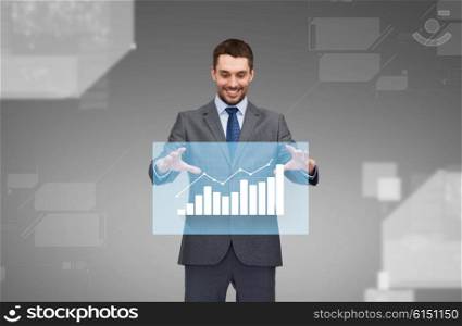 business, technology, statistics and people concept - smiling businessman working with virtual chart projection