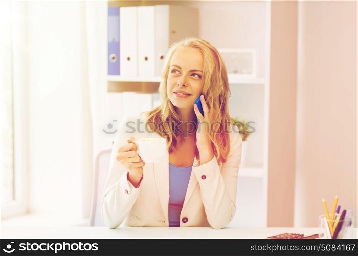 business, tecnology, communication and people concept - happy businesswoman calling on smartphone at office. businesswoman calling on smartphone at office. businesswoman calling on smartphone at office