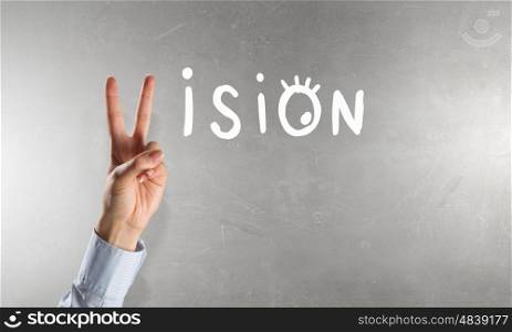 Business vision word . Vision word with fingers instead of letter V