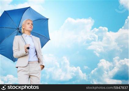 business, weather, season and people and concept - young smiling businesswoman with umbrella over blue sky and clouds background