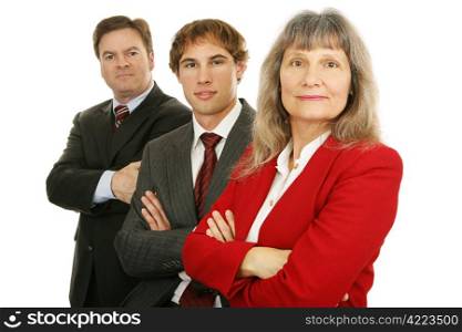 Business woman and her team with arms crossed looking serious. Isolated on white.