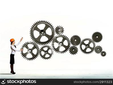 Business woman and mechanism elements