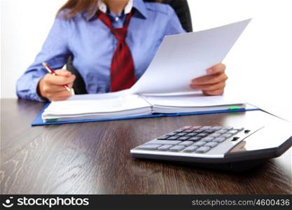 Business woman at office. Business woman at office sitting at table and working