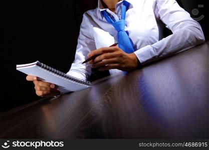 Business woman at office. Business woman at office sitting at table and working